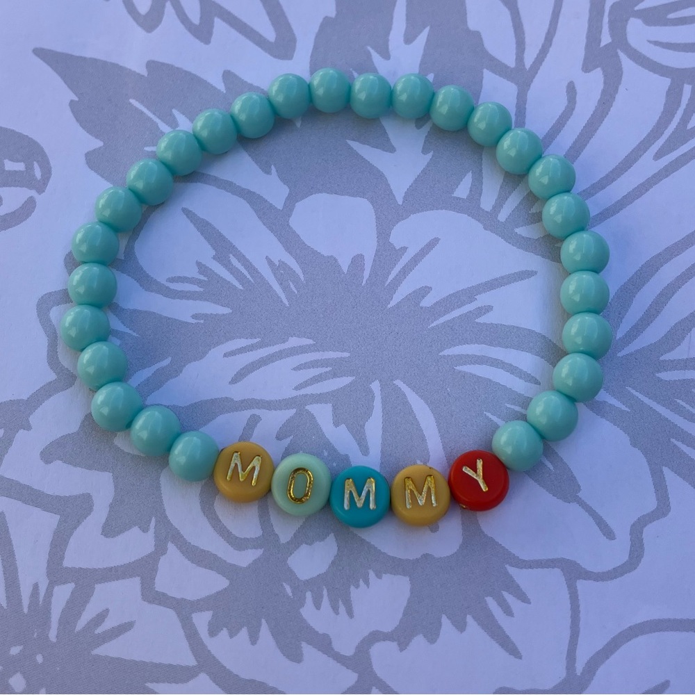 NWT Handmade stretchy beaded Mommy aqua blue bracelet